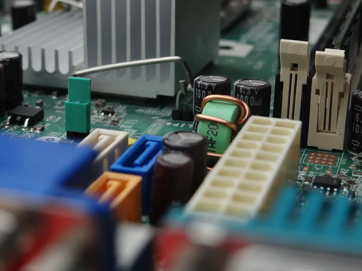 Close-up of connectors and capacitors on a circuit board.